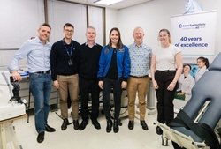 Katherine Bennell-Pegg, Professor Danail Obreschkow and Lions Eye Institute researchers watch as Professor Bill Morgan prepares to test with a man with OcuLinx